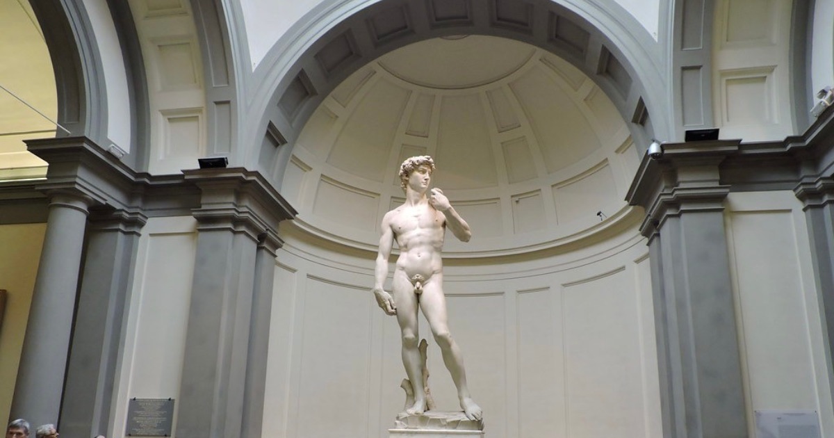 Michelangelo's David under the domed tribune of the Galleria dell'Accademia