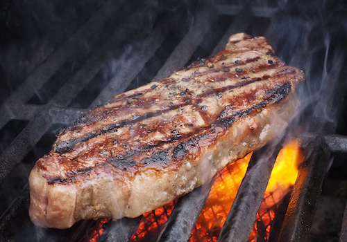 Accessible restaurant Casa Paloma close up steak on grill