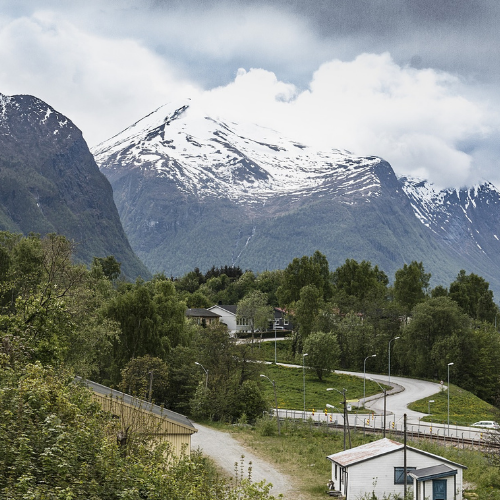 Paths surrounded by trees and mountains in Åndalsnes