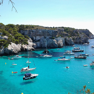 Menorca, Cala with floating boats