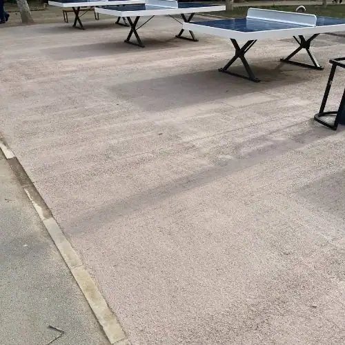 asphalted flooring near ping pong tables