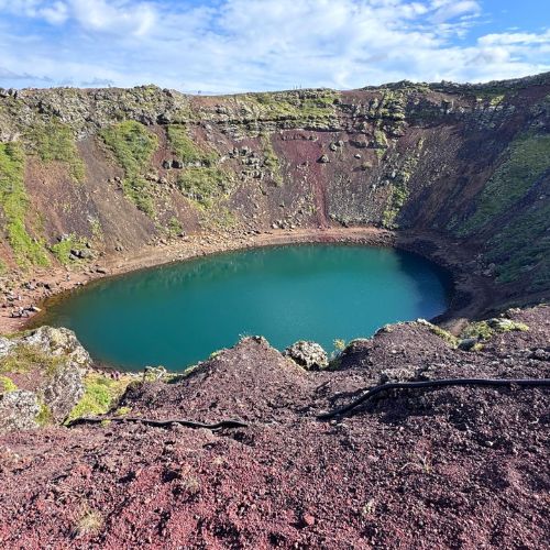 Kerið volcanic crater lake with red slopes, Iceland