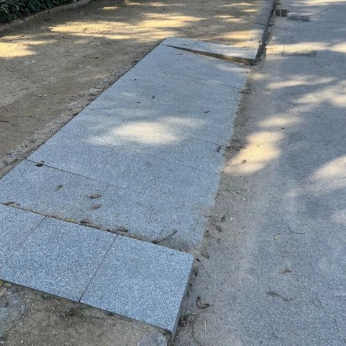 small ramp to get on a gravel path